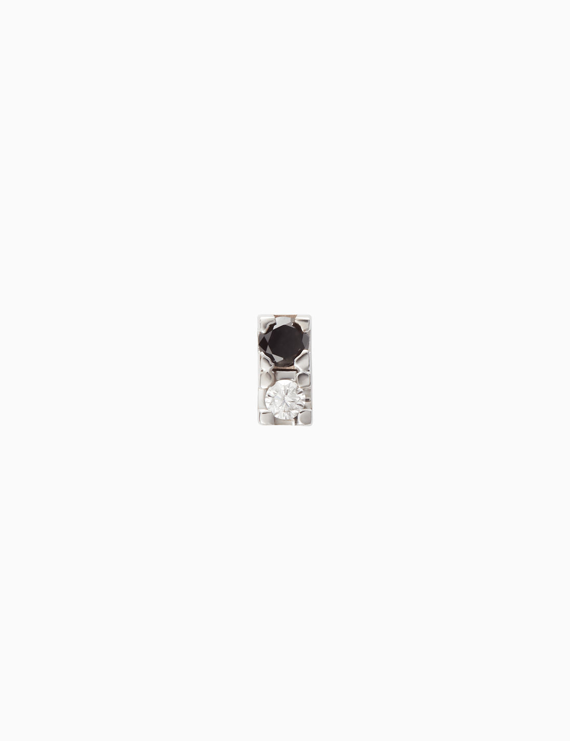Black and white diamond earring piercing
